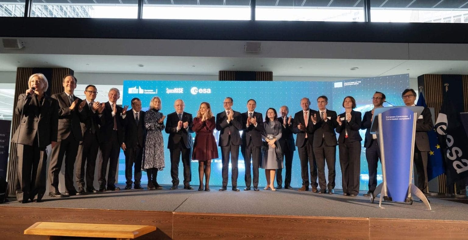 Team of people at the Iris2 signature ceremony