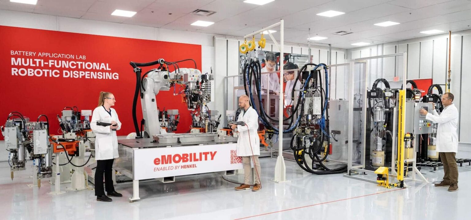 scientists in battery application lab High